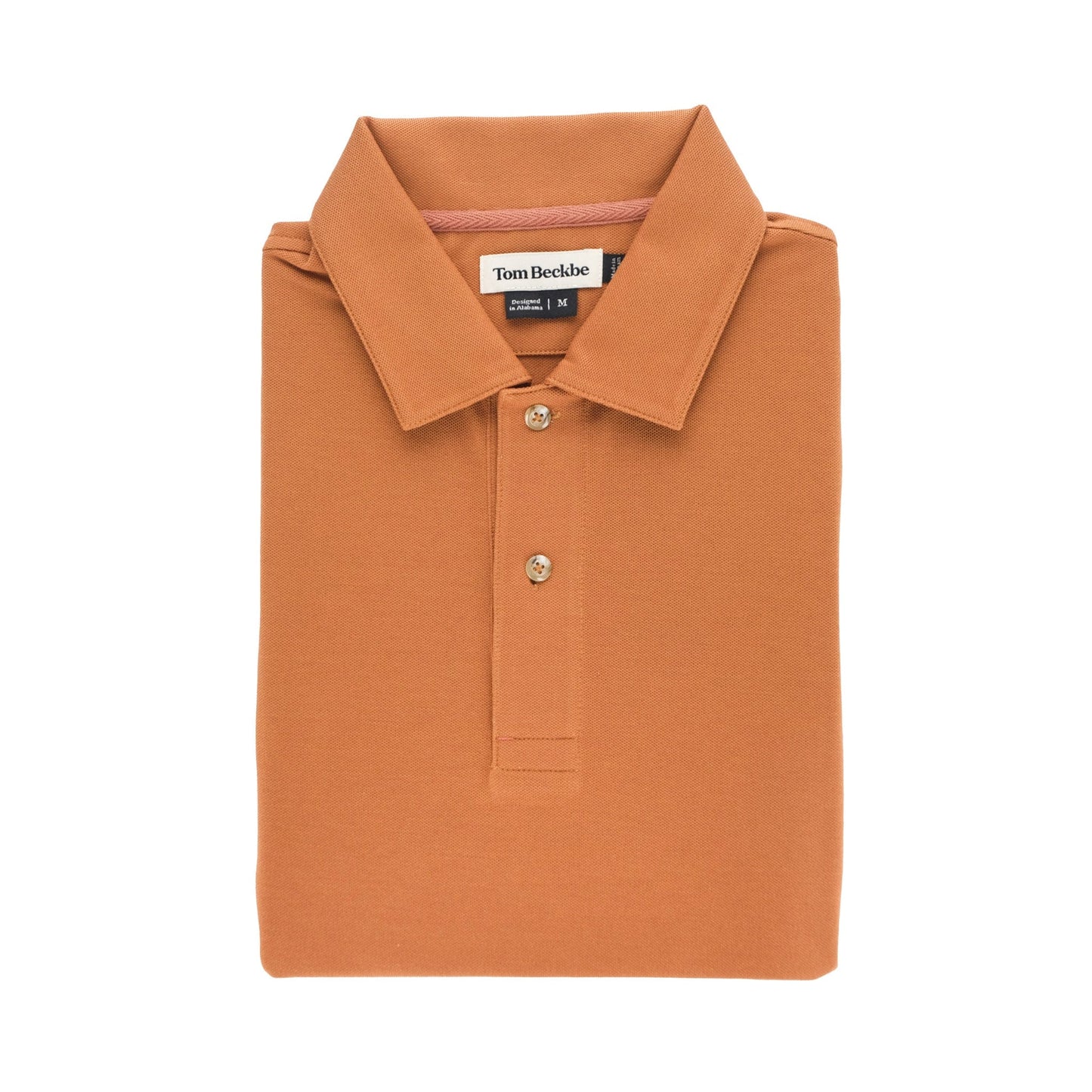 Tom Beckbes Coastal Polo Shirt: classic brown, collared, two buttons, and interior neck label.