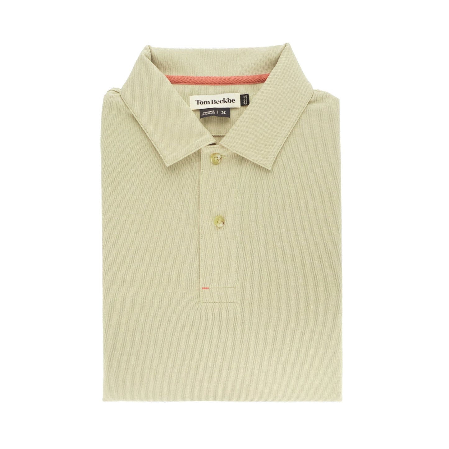 Folded beige Coastal Polo Shirt by Tom Beckbe, featuring a classic collar with two buttons and an interior sewn label.