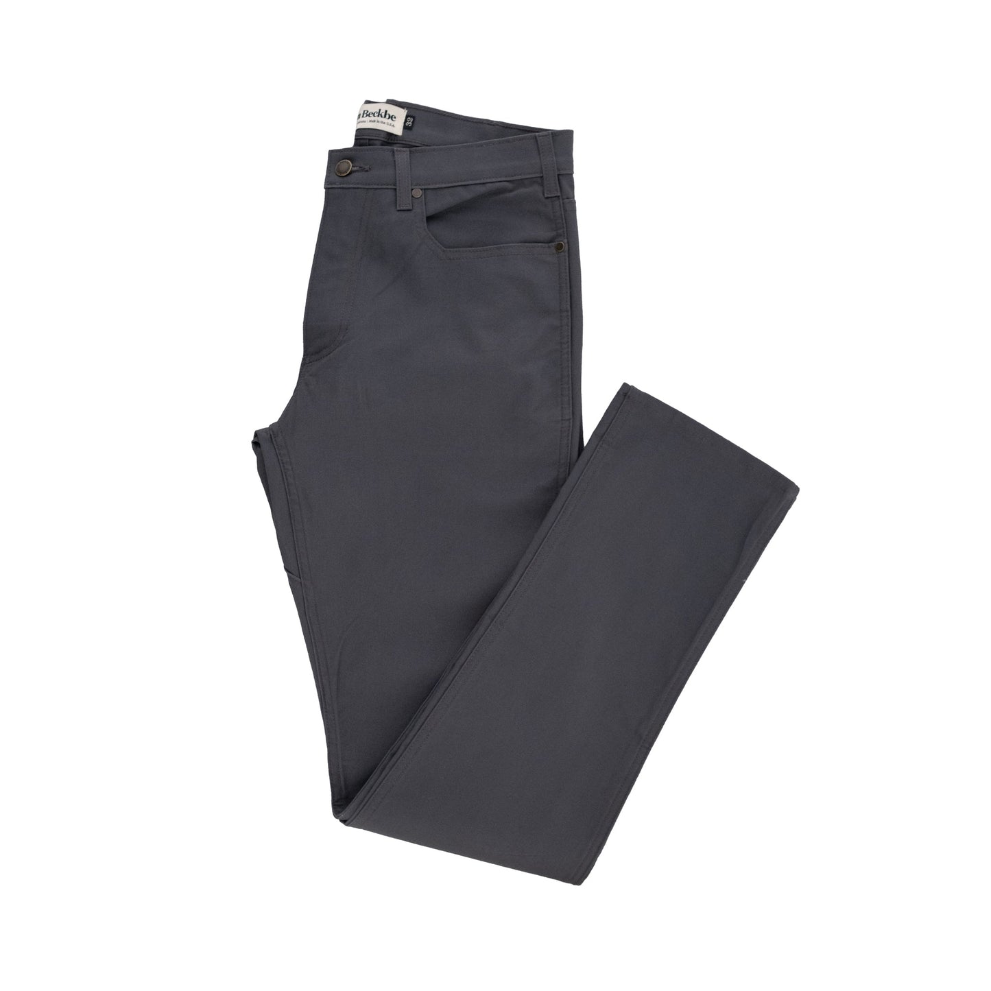 Dark gray Tom Beckbe Redmont Pant on white background, featuring a visible brand label on the waistband.