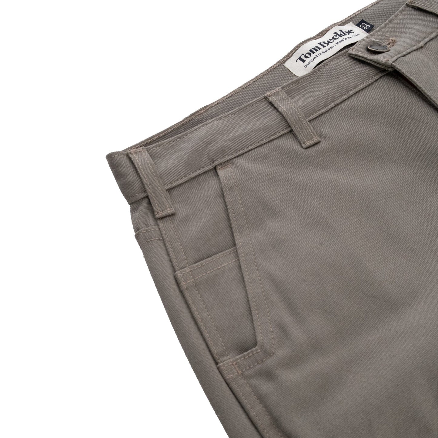 Tom Beckbes Rutledge Double-Front Pant, in gray with belt loops and pockets, offers a classic fit on white.