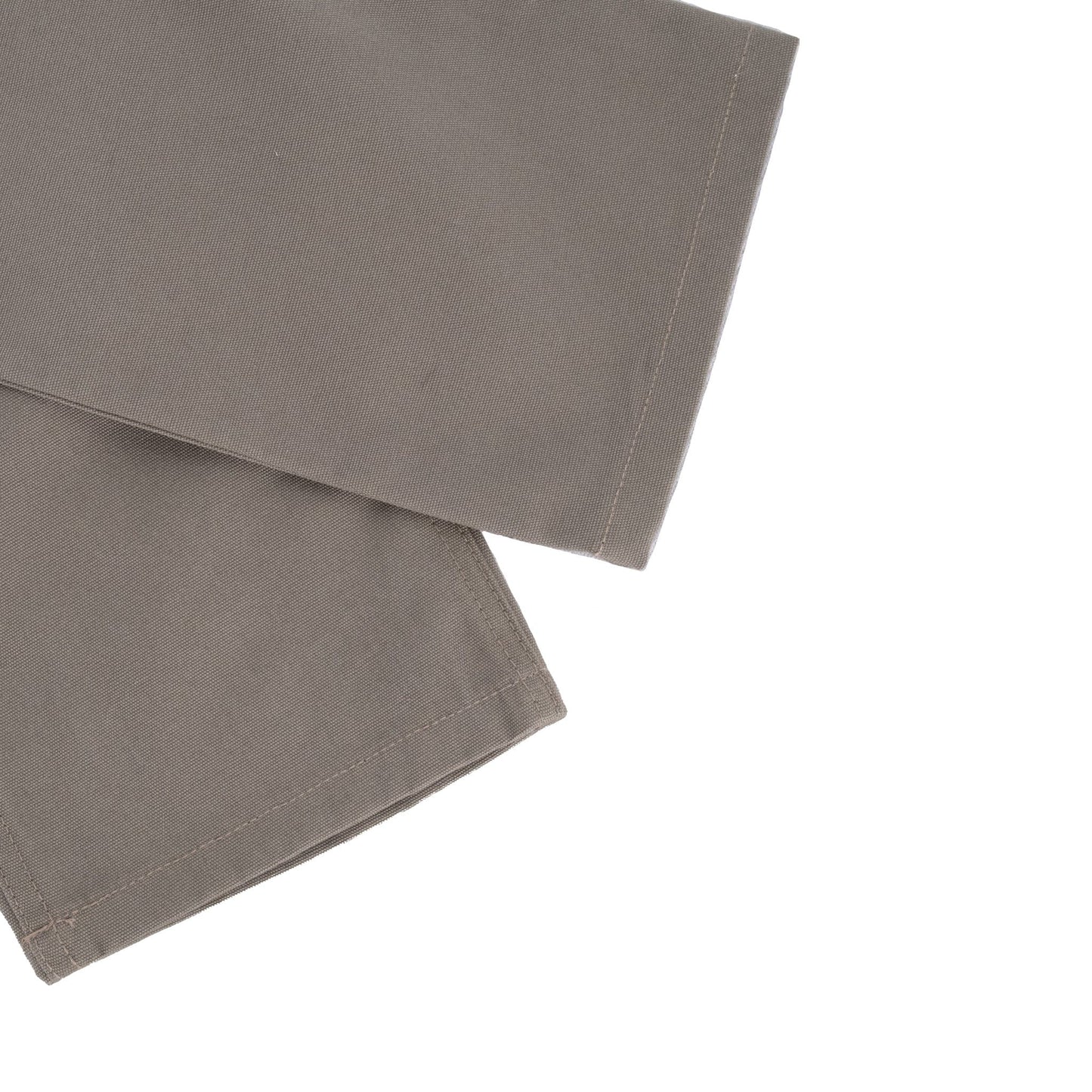 Close-up of olive Rutledge Double-Front Pant fabric by Tom Beckbe, showcasing stitching on a sleeve or pant leg.