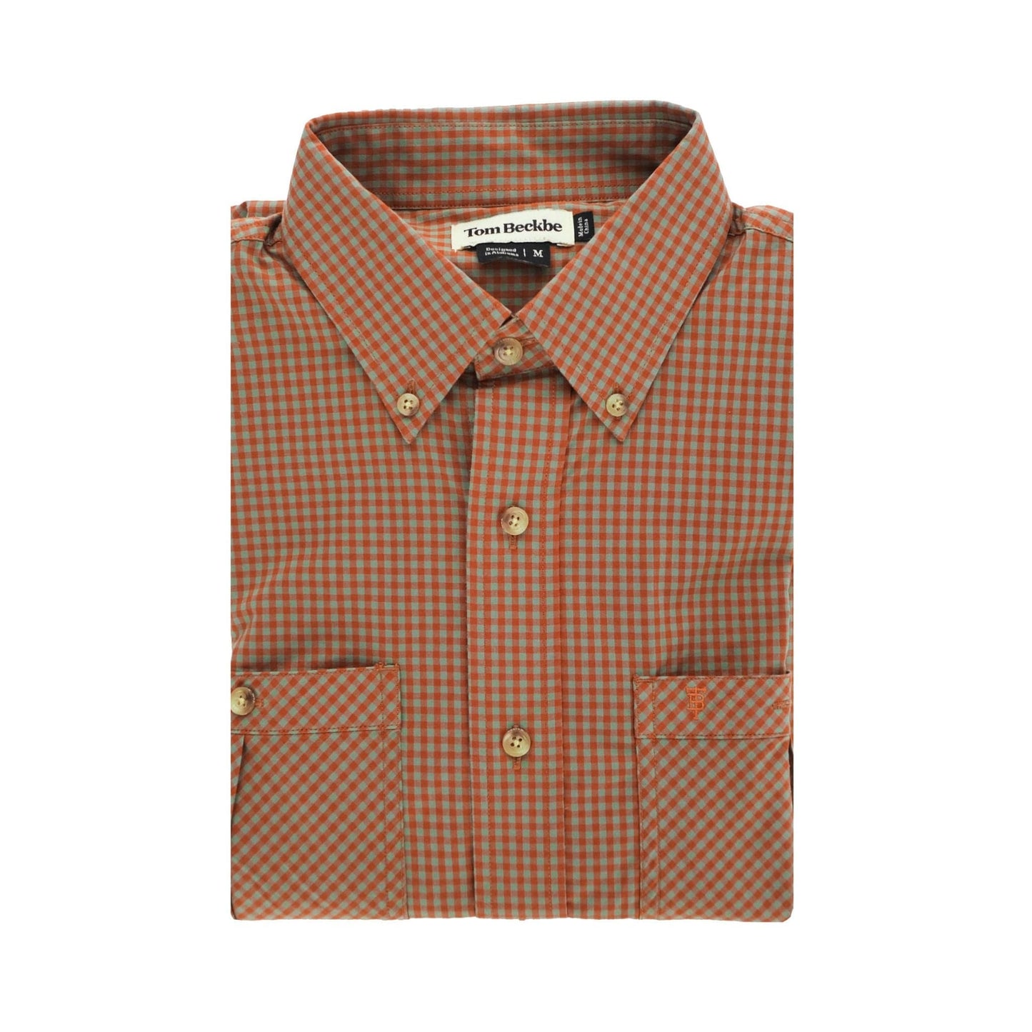 Folded checkered Tidewater Shirt by Tom Beckbe, brown and orange with a pointed collar, great for long-sleeve fishing.