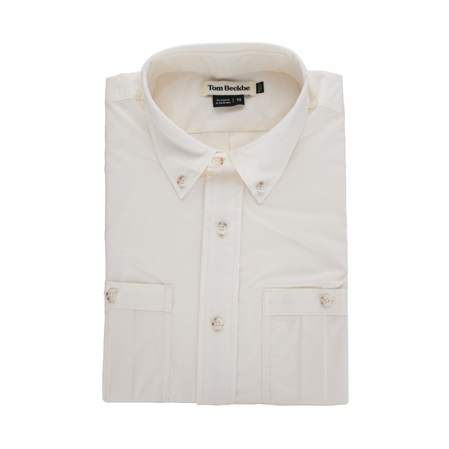 Tidewater Shirt by Tom Beckbe: Beige, short sleeves, folded with a buttoned collar and front pockets.