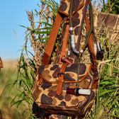 Tom Beckbes Classic Camo Blind Bag blends into tall grass with double-shell pockets and a leather-bound top.