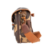 Side view of a Tom Beckbe Classic Camo Blind Bag with double-shell pockets and leather accents on a white background.