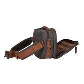 Fishing hip pack with the front pocket open 75 degrees, which secures tools and fishing essentials.