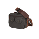 Side view of an all-weather fly fishing hip pack with two main compartments and padded waist belt.