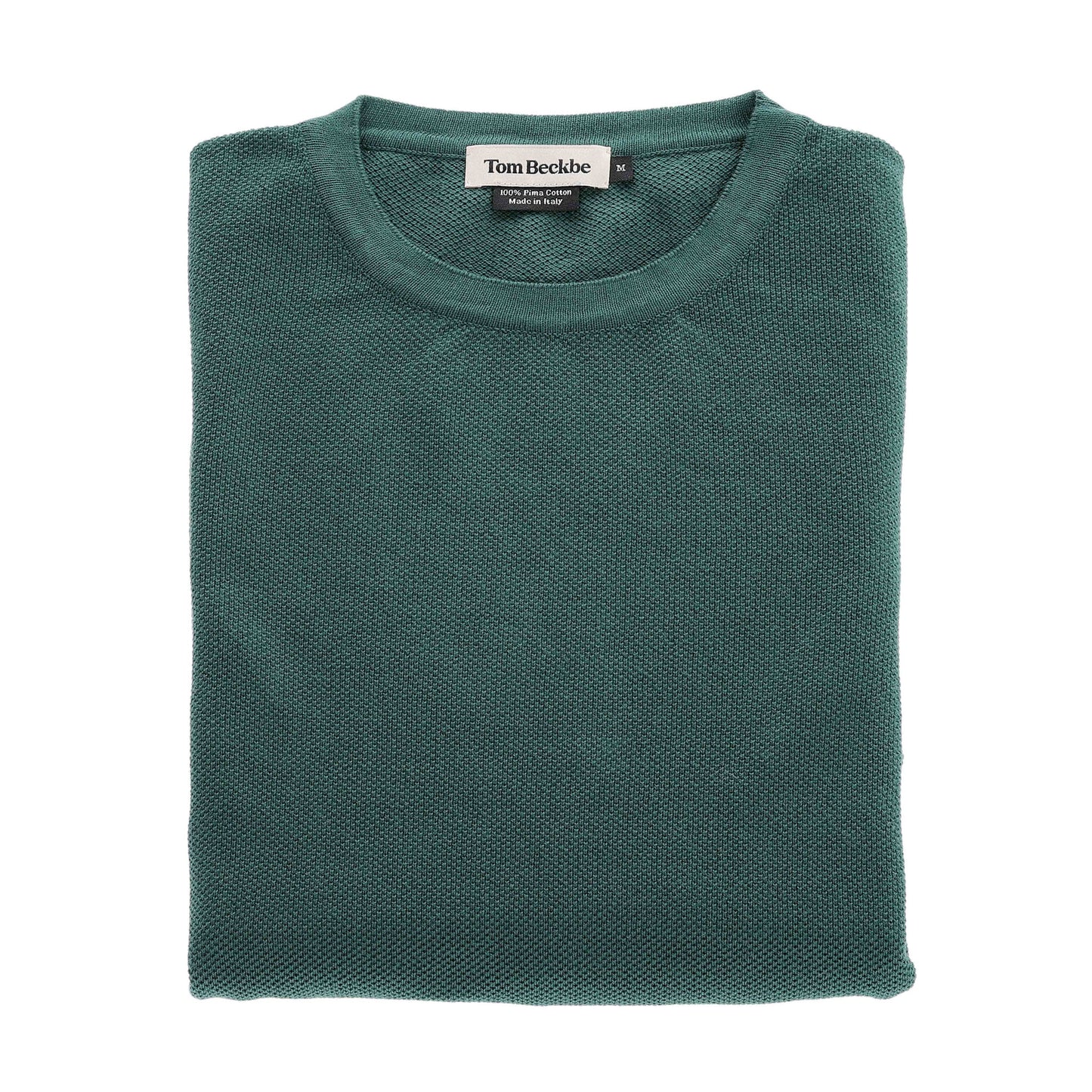 A folded green Foley Pima Crewneck Sweater by Tom Beckbe with the label shown near the collar.