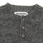 Close-up of Tom Beckbe Albemarle Henley Sweater, gray wool with three buttons, made in Scotland.