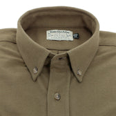 A brown Hartwell Moleskin Shirt by Tom Beckbe, a classic men’s outdoor shirt.