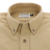 The Tom Beckbe Hartwell Moleskin Shirt is a beige mens outdoor shirt with a Ducks Unlimited label inside the collar.