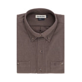 A folded brown Dixon Brushed Cotton Twill Shirt by Tom Beckbe, size large, with collar and front pockets.