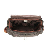 Open Tom Beckbes Canvas Field Bag in green waxed cotton with brown interior, featuring compartments and a shoulder strap.