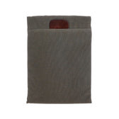 Weatherproof gray Canvas Portfolio by Tom Beckbe, featuring a brown leather accent for versatile tablet or laptop storage.