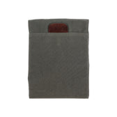 Tom Beckbe Canvas Portfolio: Gray sleeve with pocket & brown leather accent for versatile organization, on white.