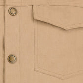 Close-up of the Tom Beckbe Crawford Jacket in beige with a pocket, visible stitching, and metal buttons.