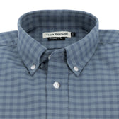 The Culver Oxford Shirt by Tom Beckbe is a blue and gray checkered button-down with a branded label inside the collar.