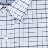 Close-up of the Tom Beckbe Culver Oxford Shirt in light blue with a dark gray check and crisp white buttons.