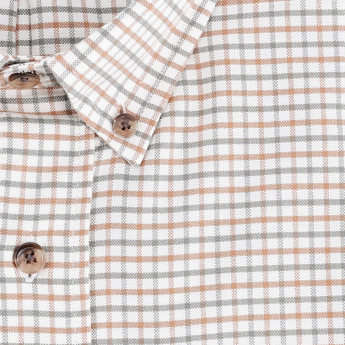 Close-up of Tom Beckbes Culver Oxford Shirt in breathable cotton with brown and gray plaid and light brown buttons.