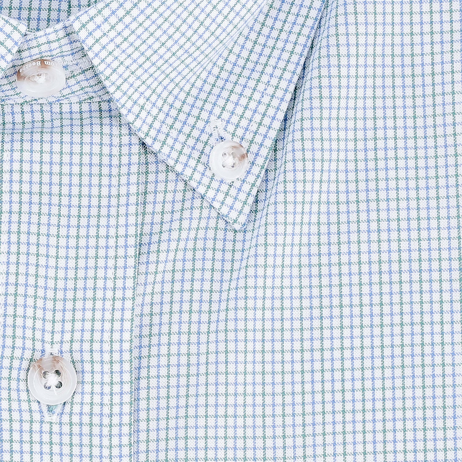Close-up of the Tom Beckbe Ensley Pinpoint Oxford Shirt in blue and green checks with collar and white buttons.