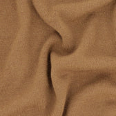 Close-up of Tom Beckbe's Henry Shawl Sweater in Royal Alpaca, highlighting its light brown knit texture and natural folds.