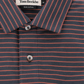 Close-up of Tom Beckbe's Hutton Performance Polo, gray/red stripes, breathable, two-button, made in Peru.