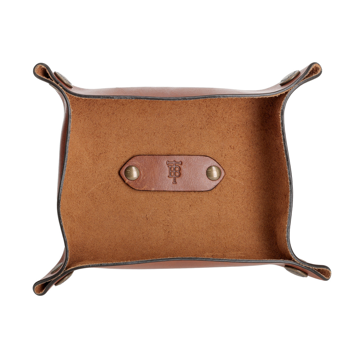 Tom Beckbe Leather Change Tray in brown American leather with suede interior, debossed logo, shown top-down.