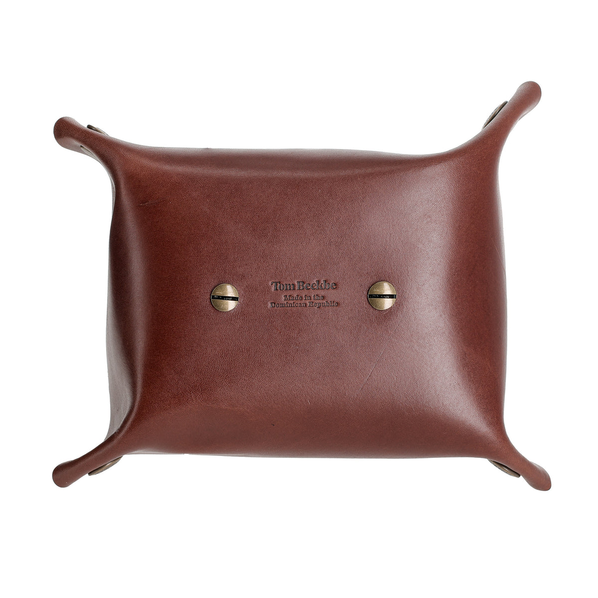 Tom Beckbe Leather Change Tray: American leather, raised corners, brass rivets, embossed center.