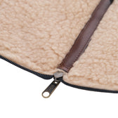 Close-up of Tom Beckbes Leather Fly Wallet, showcasing quality materials with a brown leather trim and a black zipper.