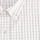 Close-up of the Monroe Poplin Shirt by Tom Beckbe: white breathable cotton with beige and gray grid pattern, white buttons.