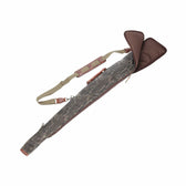 Tom Beckbe Canvas Gun Sleeve in Mossy Oak Original Bottomland with brown accents, shoulder strap, and zippered closure.