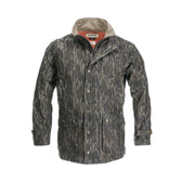 Tom Beckbes Tensaw Jacket in Mossy Oak Original Bottomland has multiple pockets, button closures, and a high collar.