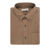 The Culver Oxford Shirt by Tom Beckbe is a brown cotton shirt with a collar, front pocket, and neck label.