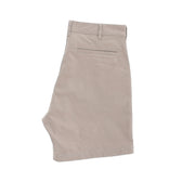 Reid Short by Tom Beckbe: Mid-rise khaki cotton chinos with a back pocket and brass zip fly on a white background.