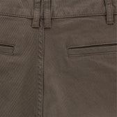 Close-up of Tom Beckbes Reid Short in mid-rise brown with waistband, belt loops, brass zip fly, and two closed welt pockets.