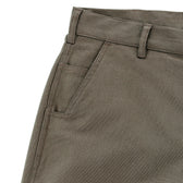 Close-up of Tom Beckbe Stafford Double Front Pant for men showing waistband, belt loop, and front pocket.