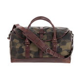 Tom Beckbe Classic Camo Weekender Duffel Bag with brown leather straps, handles, and trim shown on white background.