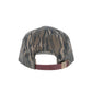 Back view of Tom Beckbe Waxed Cotton Ramsey Cap in Mossy Oak Original Bottomland with adjustable brown strap and metal clasp.