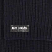 Close-up of the Tom Beckbe Wool Scarf in navy blue ribbed lambswool, made in the United Kingdom.