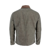Back view of the Tom Beckbe Steward Jacket, featuring waxed shelter cloth, a brown corduroy collar, and button cuffs.