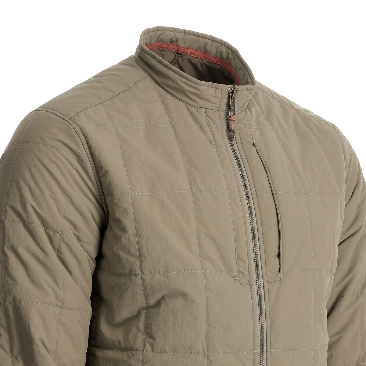 Light brown quilted jacket with front zipper and chest pocket, displayed on a plain background.