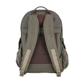 The Tom Beckbe DU Canvas Backpack in khaki features padded shoulder straps and a top carrying handle, shown from the back.