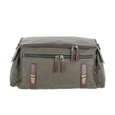 Tom Beckbe DU Canvas Field Bag in olive green with brown leather accents, zippers, and side pockets on white background.