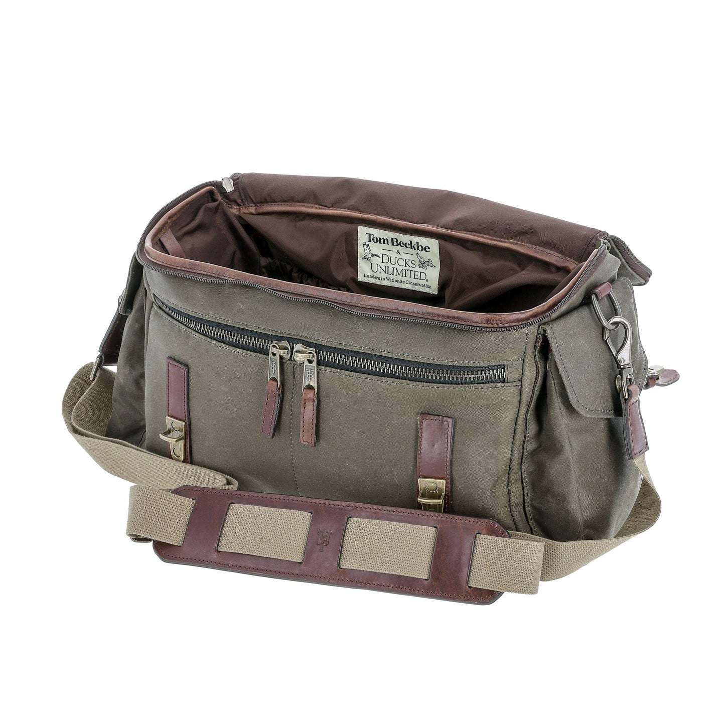 Tom Beckbe DU Canvas Field Bag in olive green with brown leather accents, open to show interior and zippered pockets.