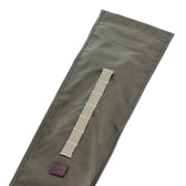 The Tom Beckbe DU Roll Top Gun Sleeve in olive green with stitched strap—ideal for waterfowl hunting gear.