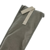 A close-up of the Tom Beckbe DU Roll Top Gun Sleeve in olive green with a beige strap and buckle on a white background.