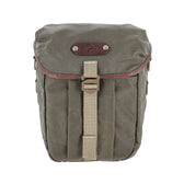 The DU Timber Bag by Tom Beckbe: khaki waxed cotton canvas, leather trim, duck logo—classic style, shown on white.