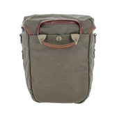Tom Beckbe DU Timber Bag in olive waxed canvas with brown leather handles and front snap, shown on white background.