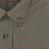 Close-up of a green collared shirt with a brown grid check pattern and visible buttons.