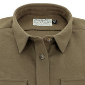 The Womens Mackay Moleskin Shirt by Tom Beckbe is a brown cotton collared button-up with a Ducks Unlimited label inside.